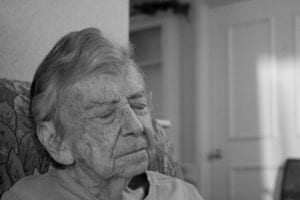 elderly woman eyes closed