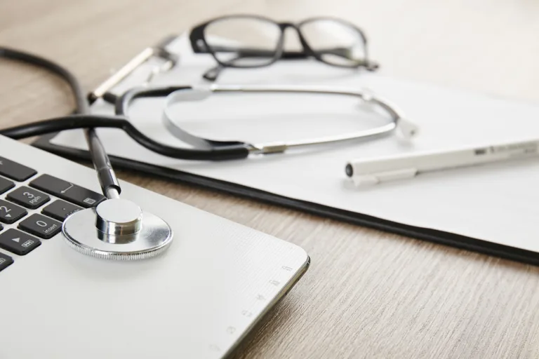 Medical equipment and technology concept. Laptop and stethoscope.